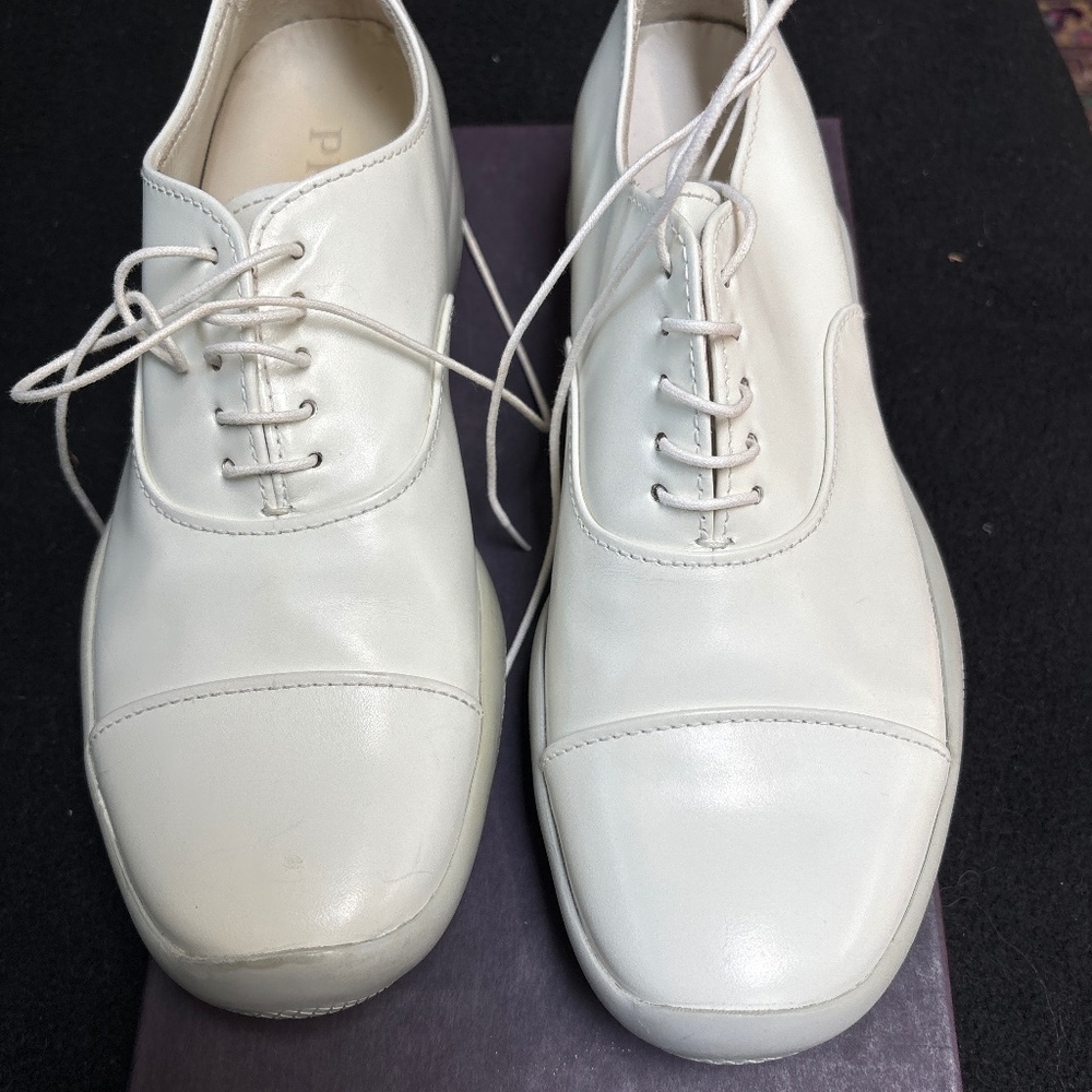 NEW Prada white leather sneaker type wingtip tie shoes. Never worn